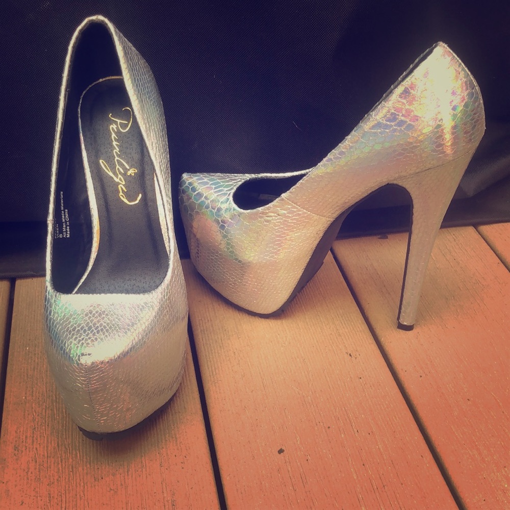 Privileged Hologram pumps. Like new